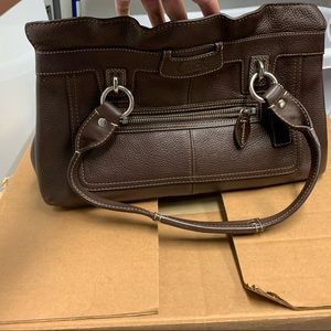 Brown leather coach purse
